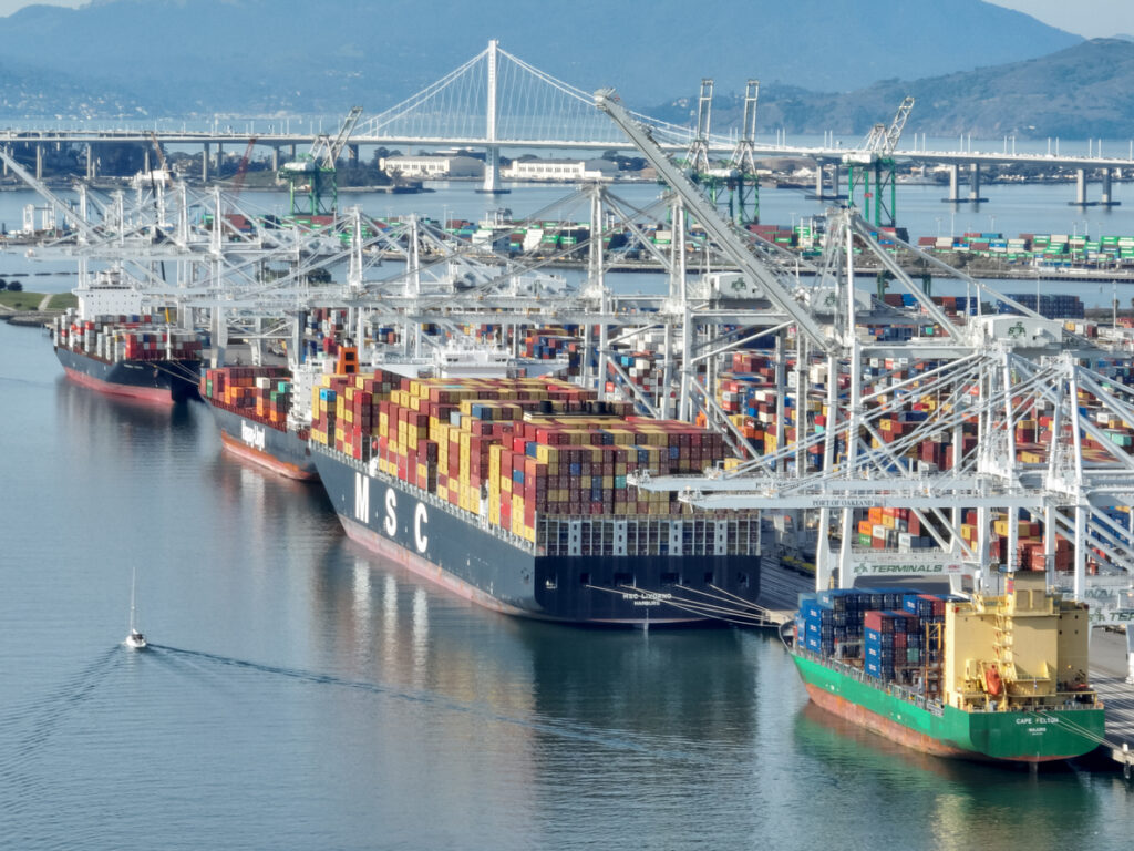 Dock with a lot of boats and shipping boats